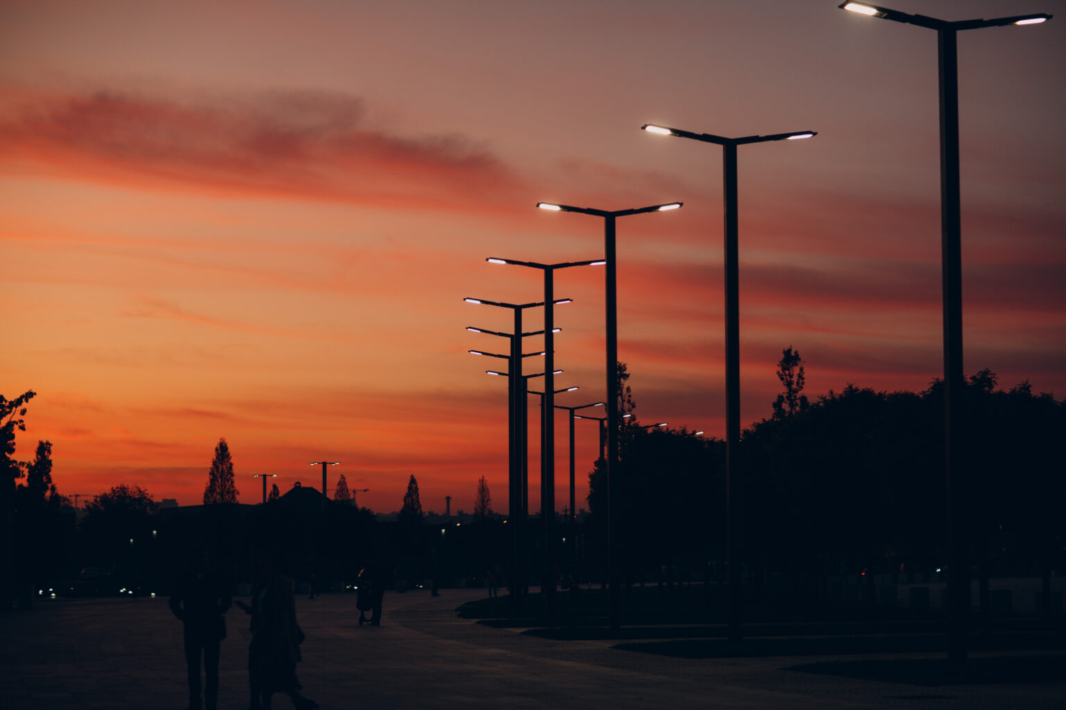 LED street lights in the evening on a sunset background